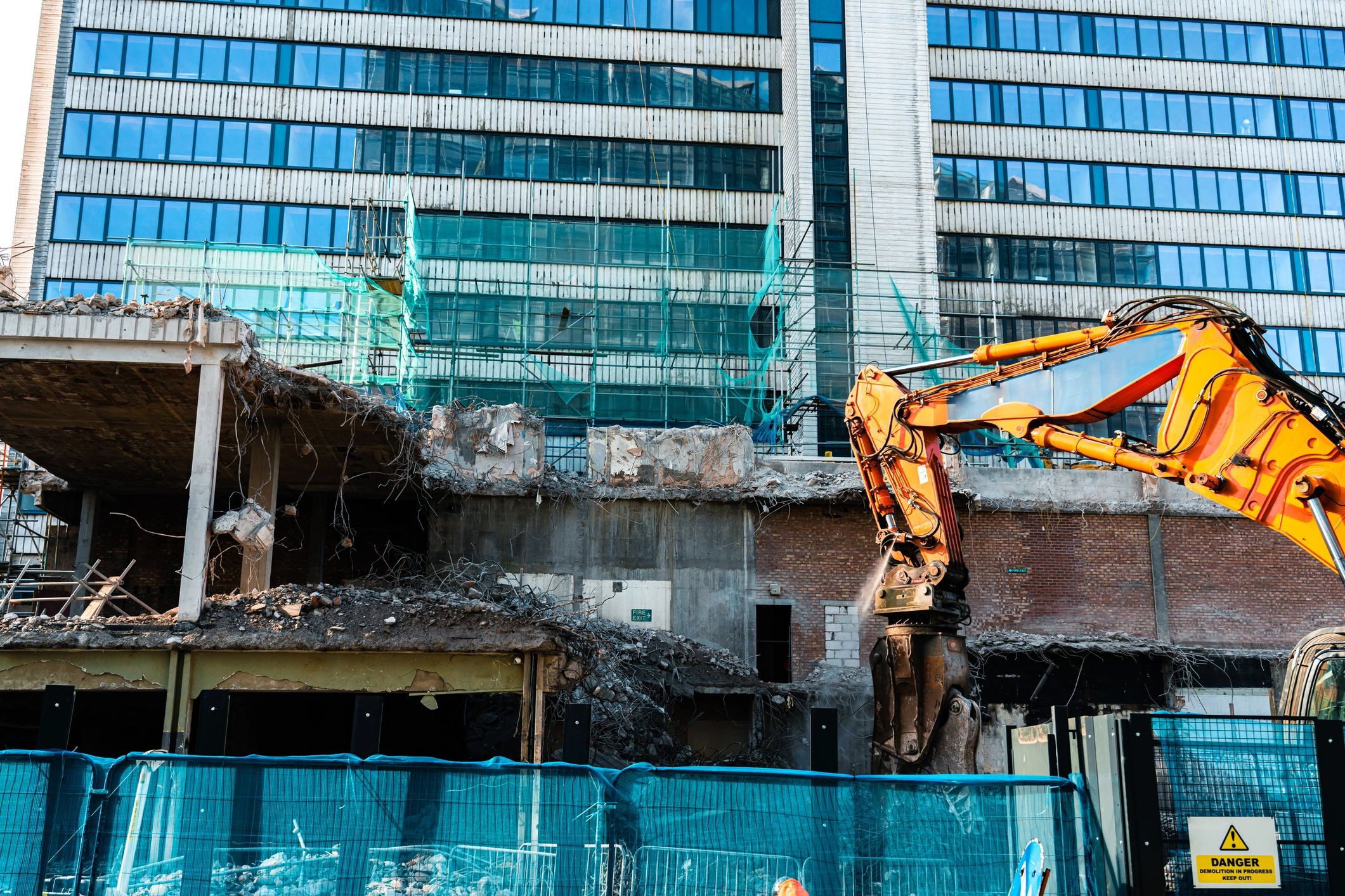 demolition of house and commercial building