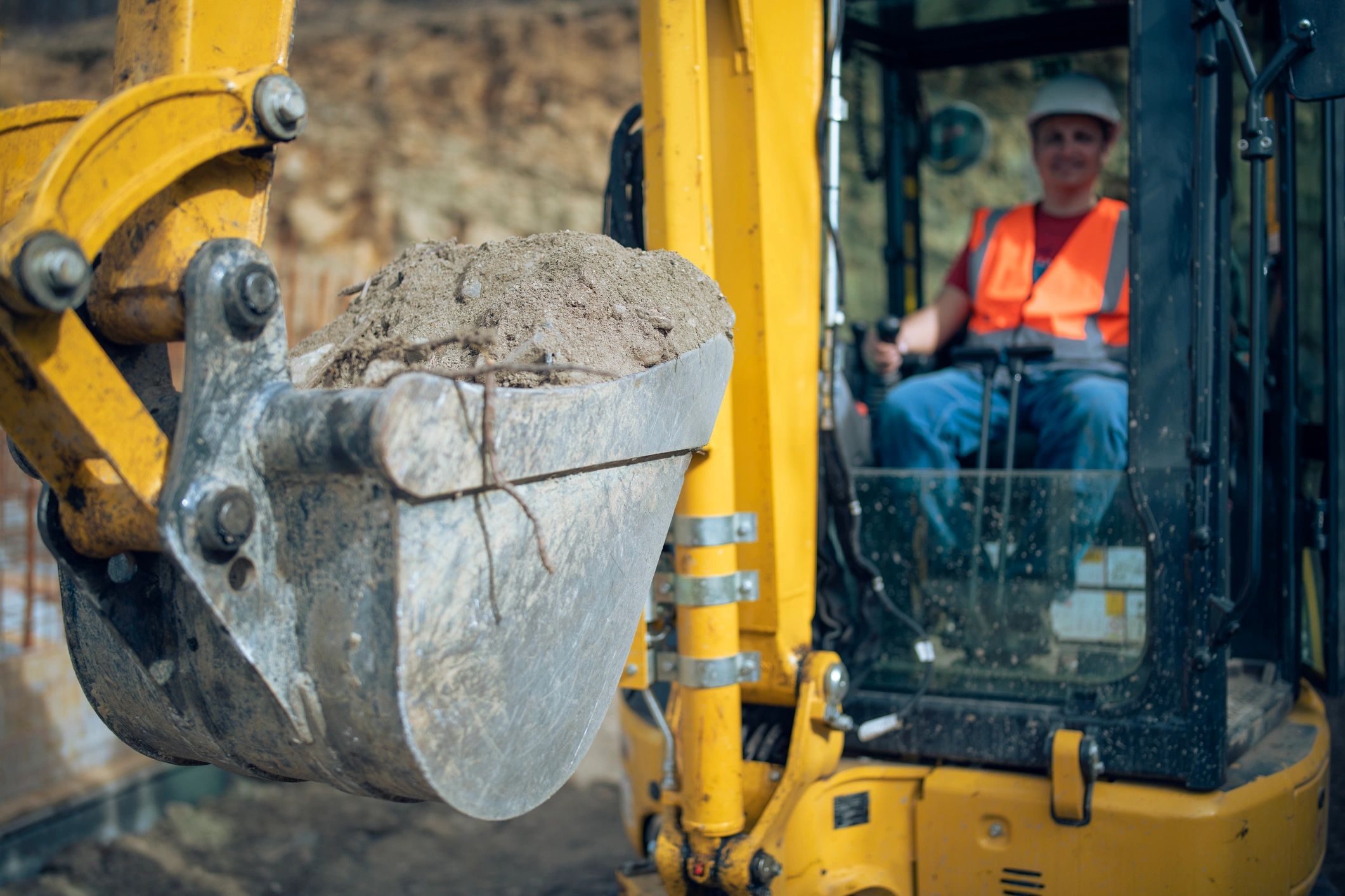 excavator clearing site