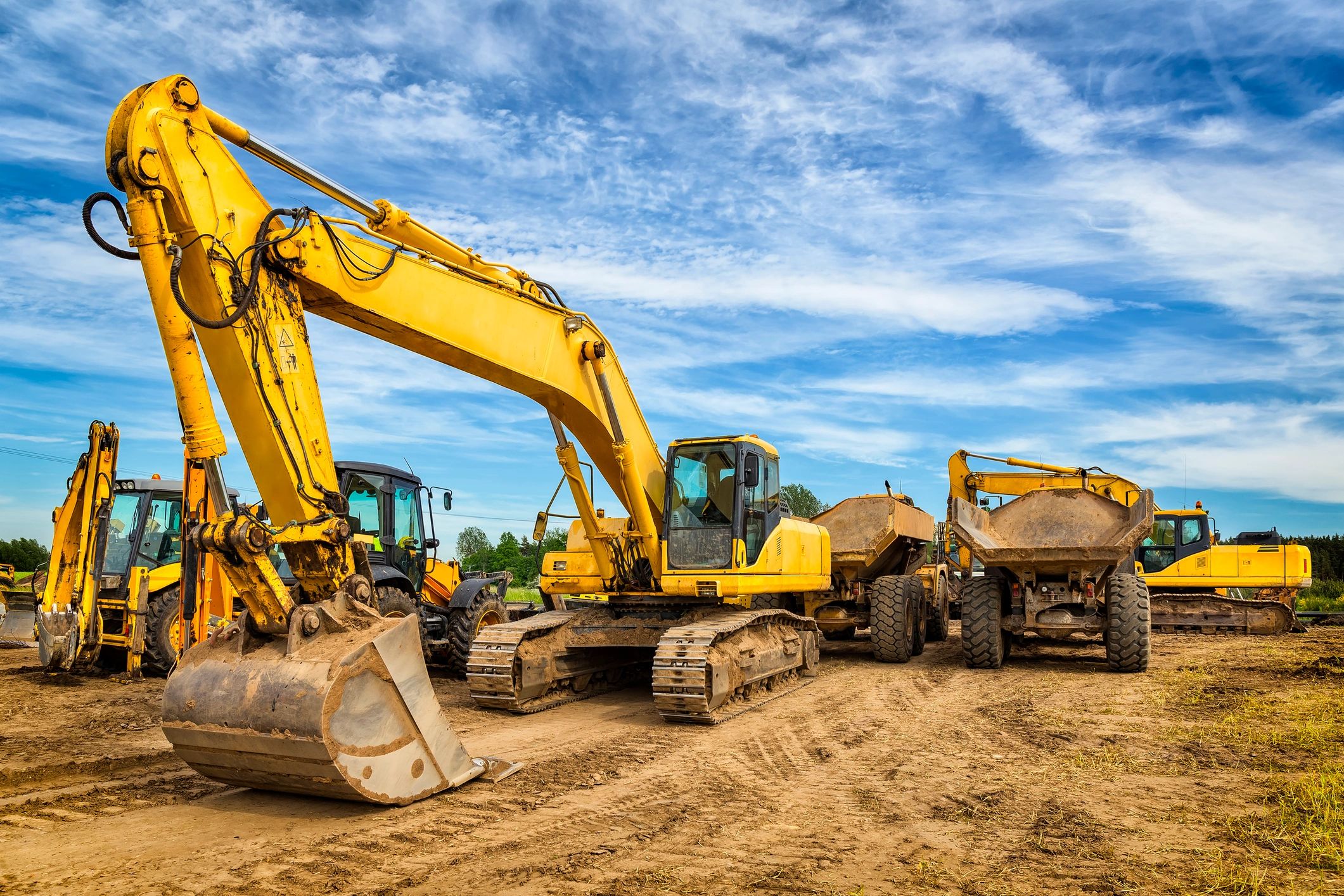 Asphalt removal using construction machinery