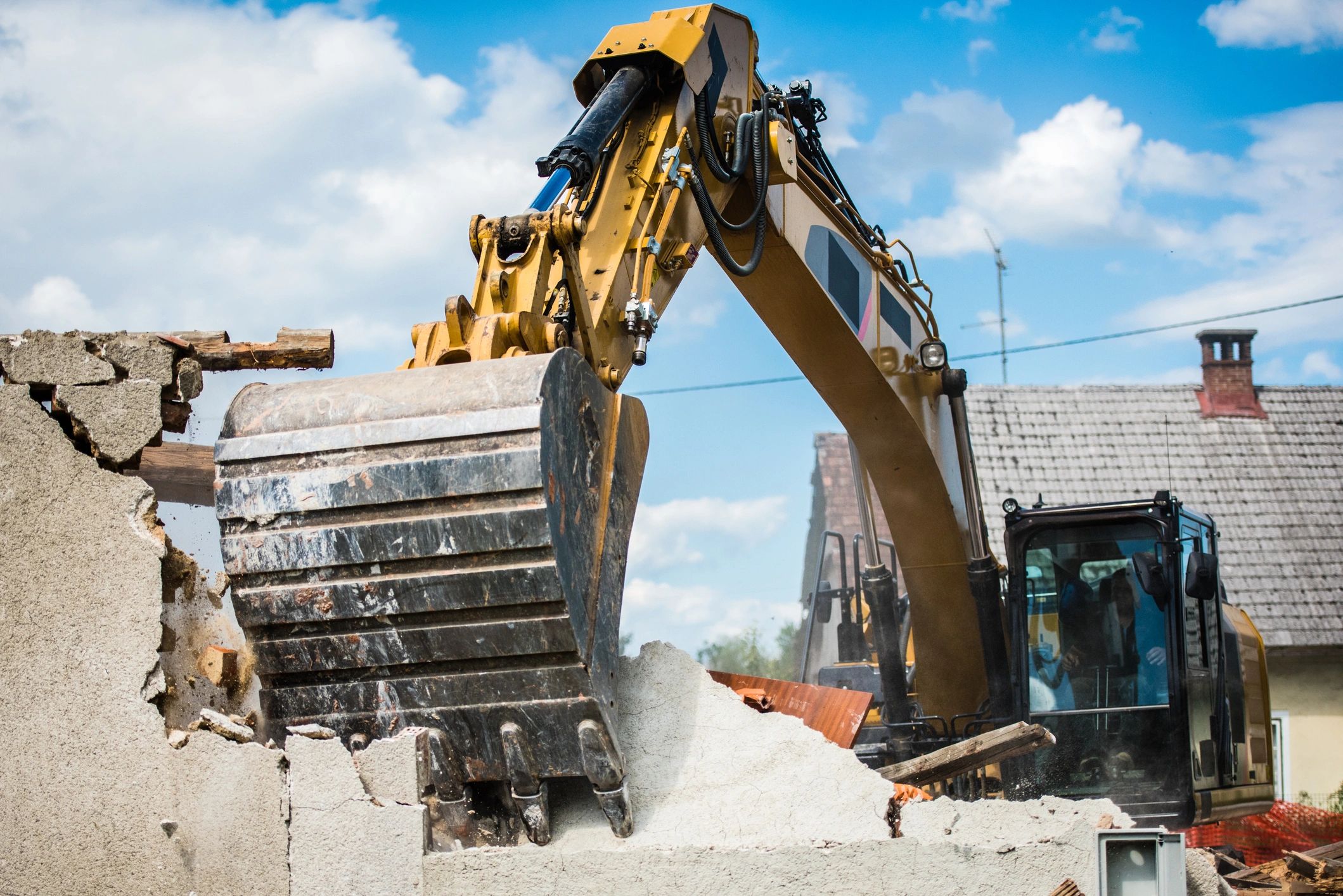 demolition of house and commercial building